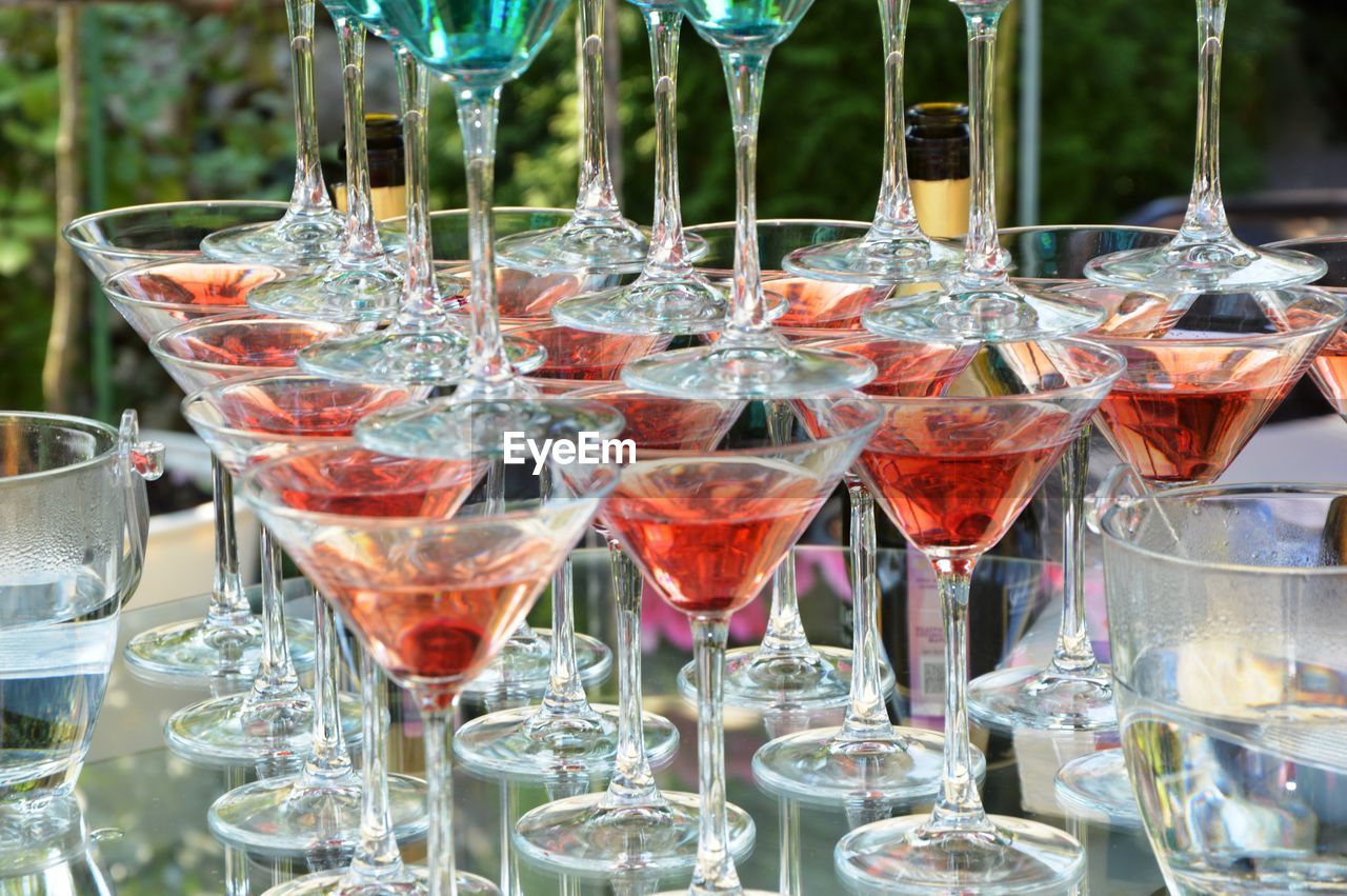 CLOSE-UP OF GLASSES ON TABLE