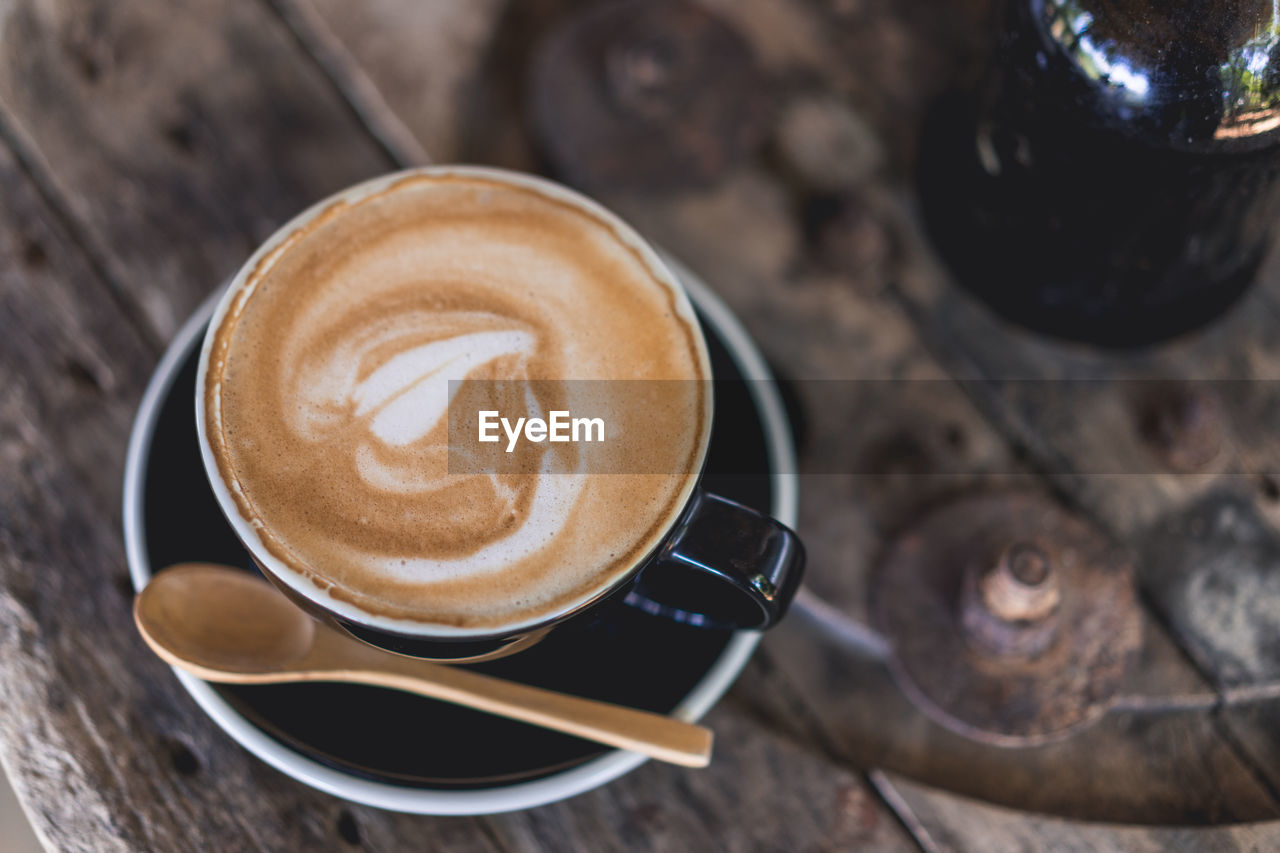 Close-up of coffee cup on table