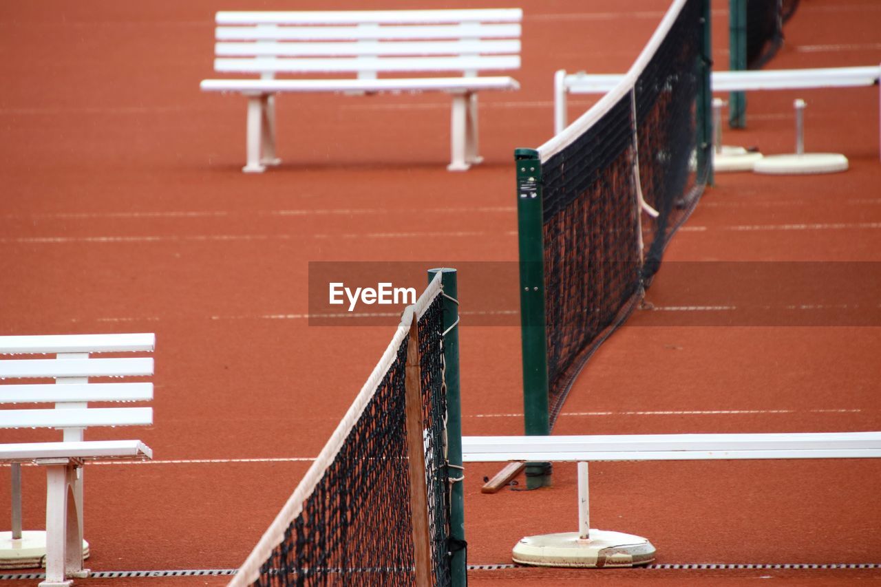 High angle view of empty seats on tennis court 