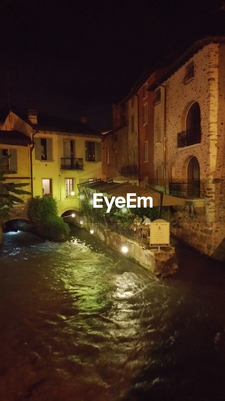 VIEW OF CANAL AT NIGHT