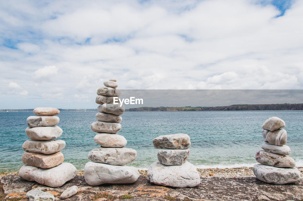 STACK OF STONES ON SHORE