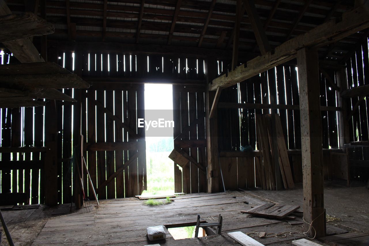 VIEW OF BARN HANGING IN OLD WOODEN WALL