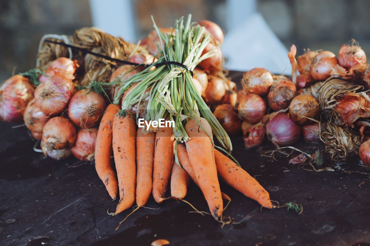 Close-up of newly fresh harvested vegetables for sale in market