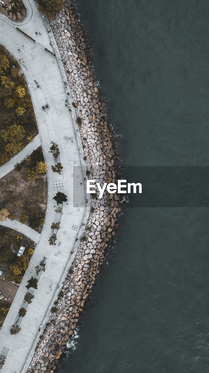 High angle view of road by sea during winter