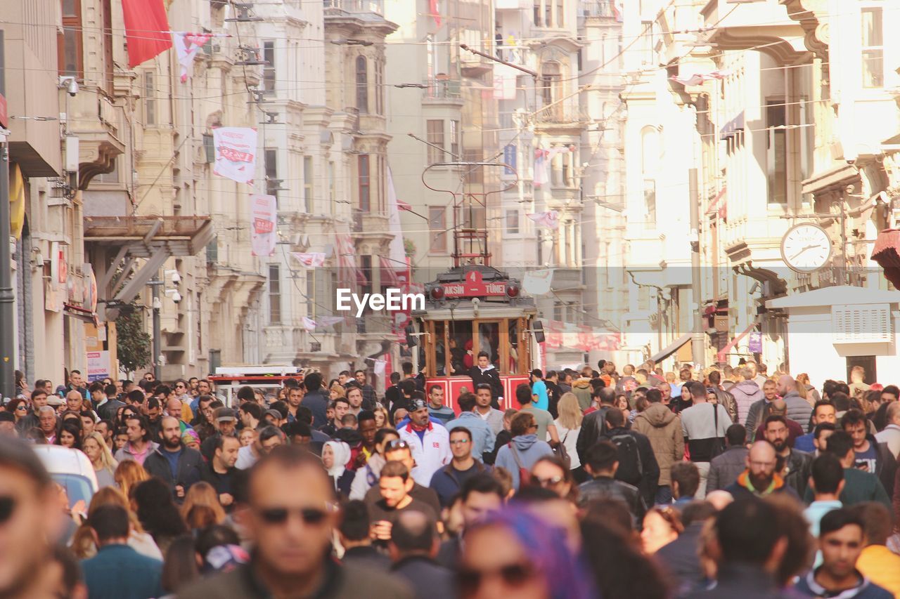 People walking on beyoglu  istiklal street in  metropolis istanbul city