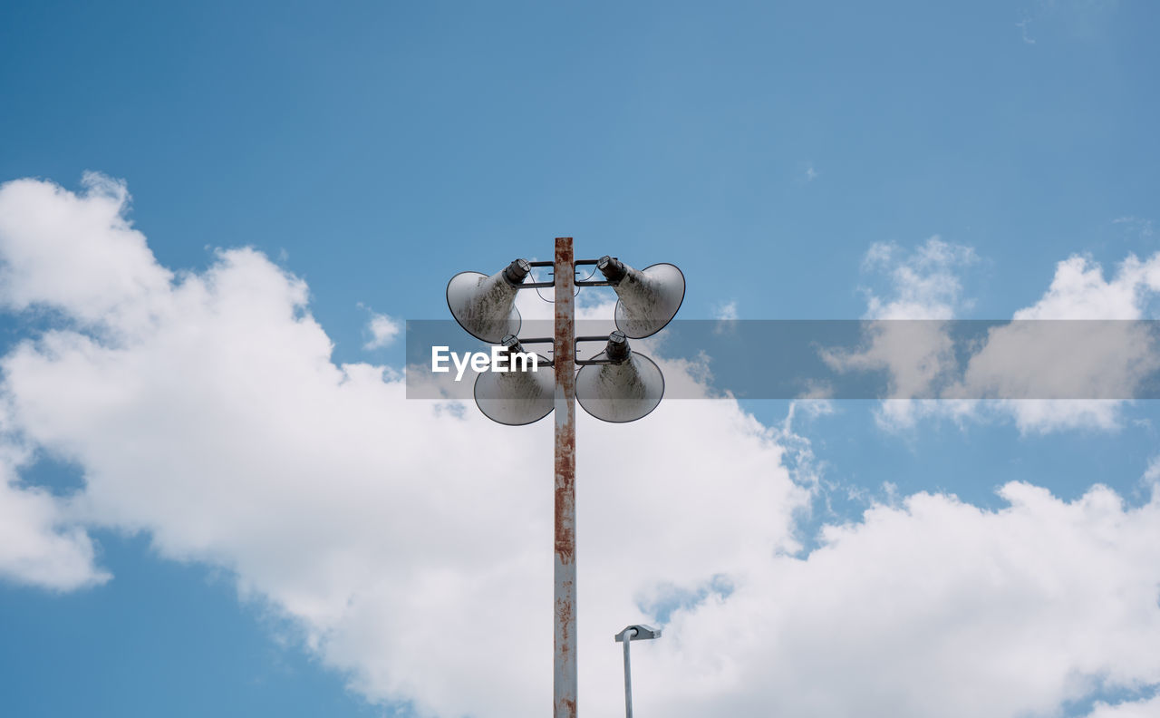 Low angle view of street light against sky