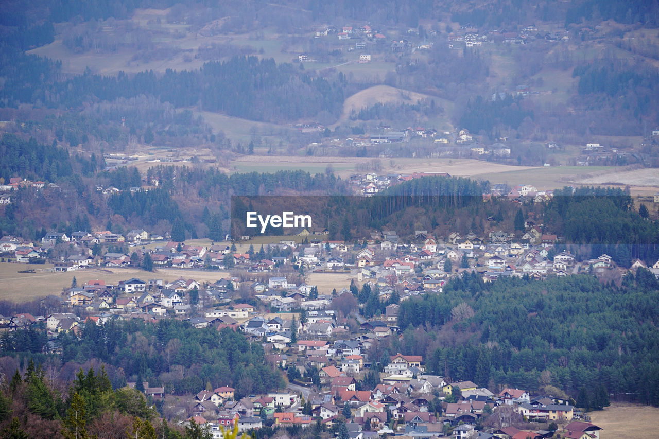 High angle view of townscape and mountains