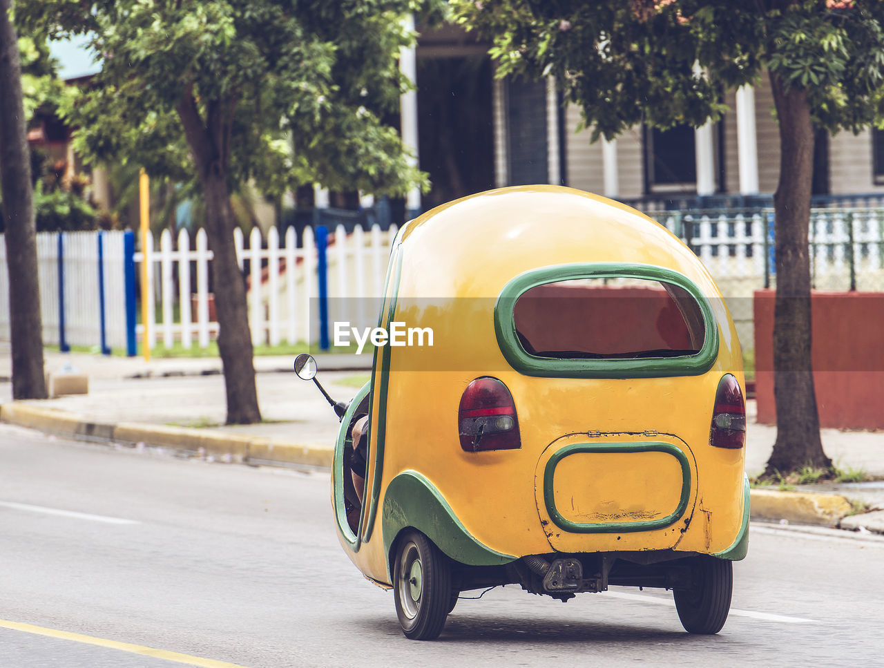 Yellow car on street