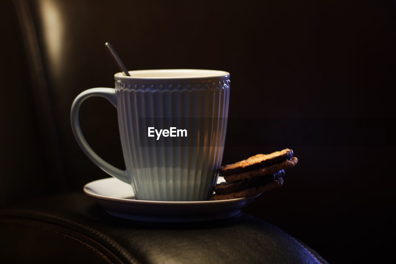 Close-up of coffee cup on table