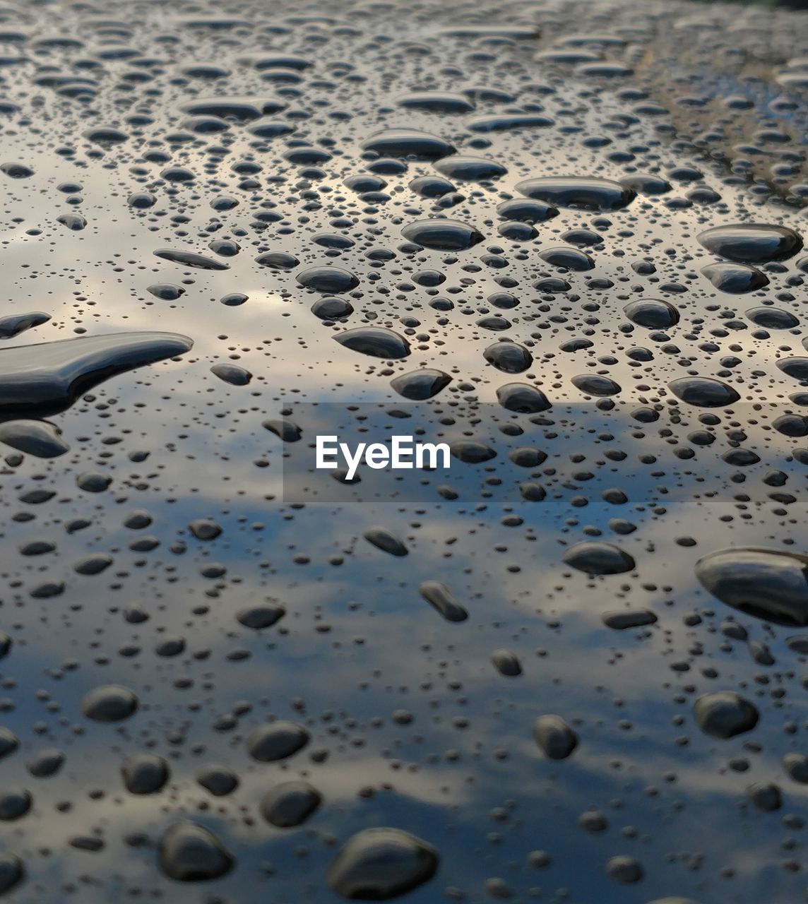 HIGH ANGLE VIEW OF WET SAND ON SNOW