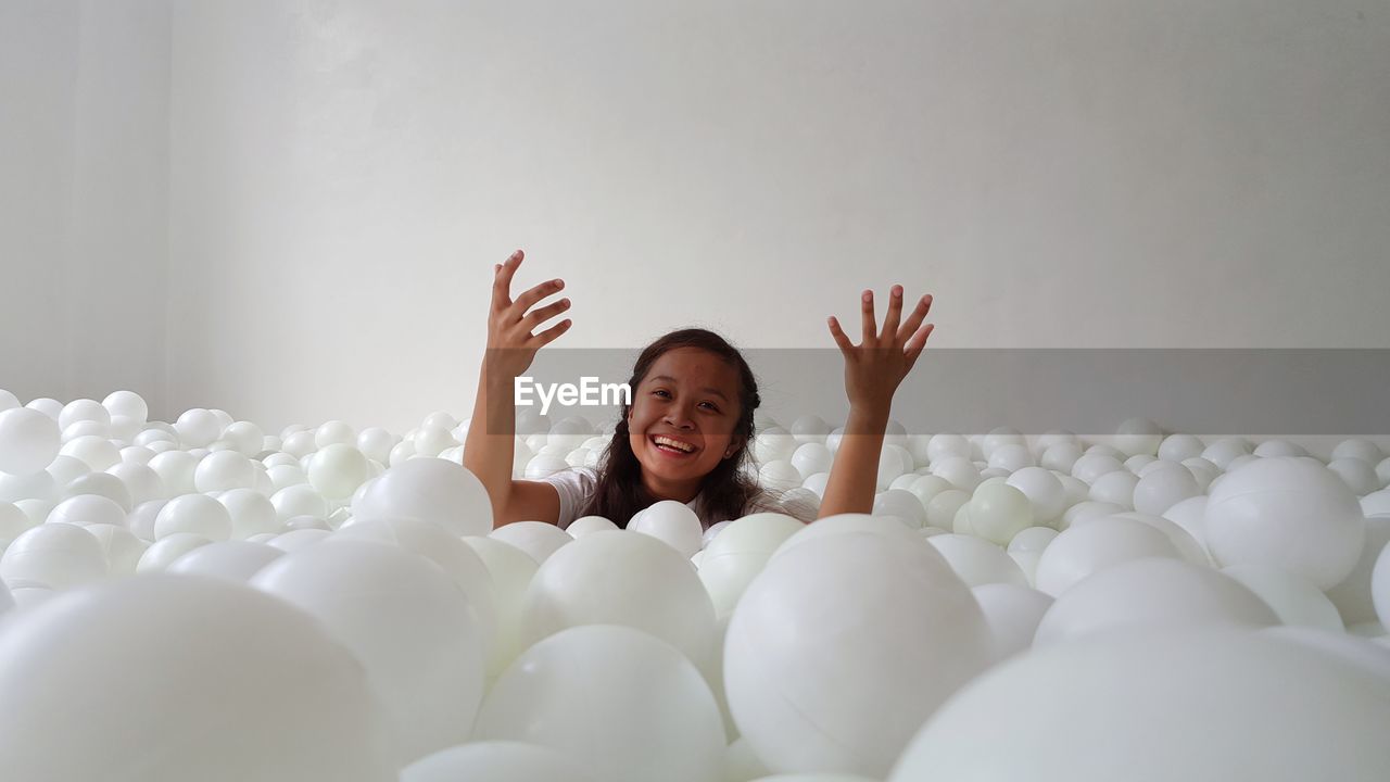 Woman enjoying in ball pool