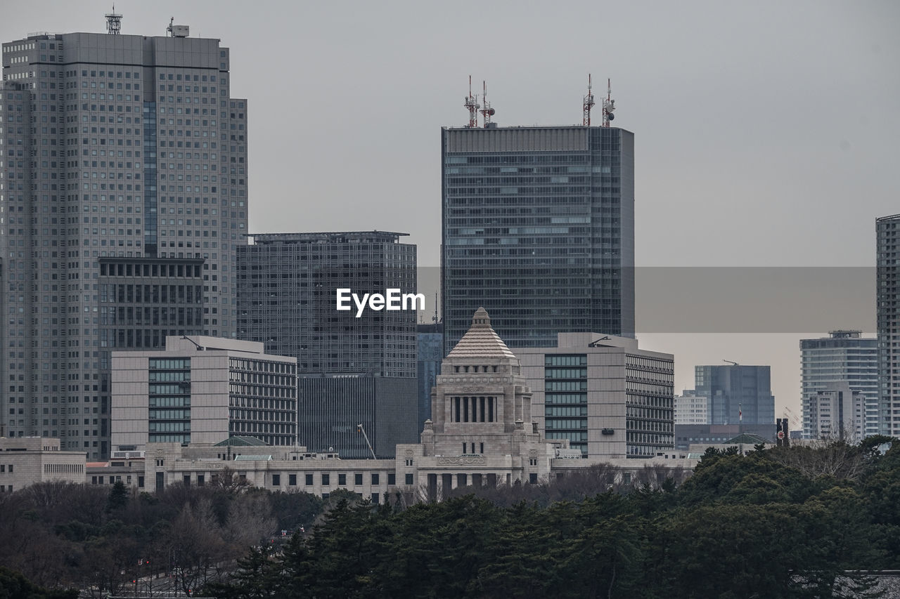 MODERN BUILDINGS AGAINST SKY