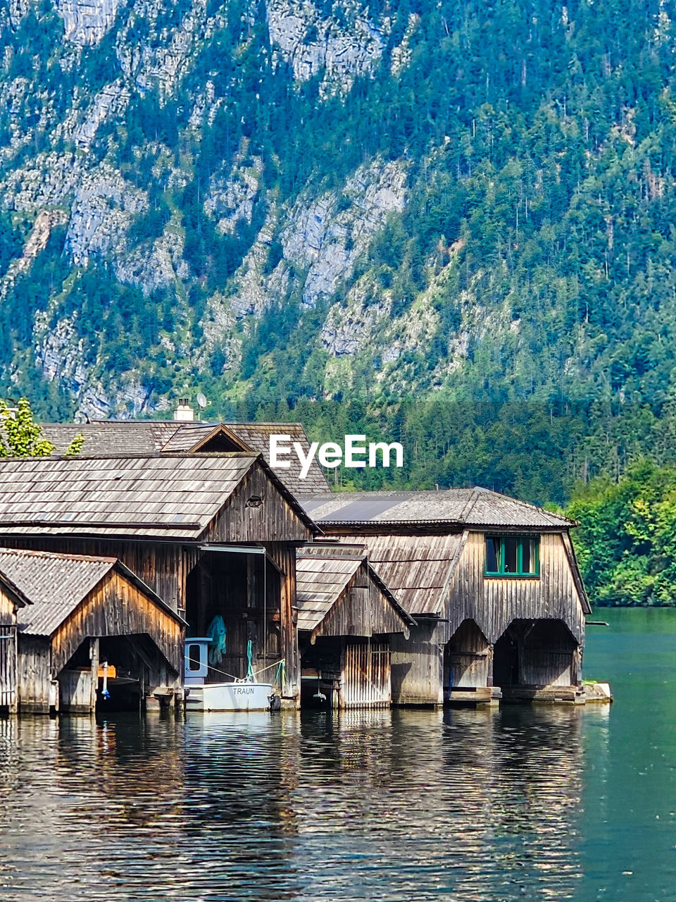 water, architecture, built structure, nature, building exterior, tree, house, plant, building, river, no people, stilt house, day, beauty in nature, hut, waterfront, wood, residential district, scenics - nature, outdoors, tranquility, landscape, travel destinations, boathouse, environment, tranquil scene