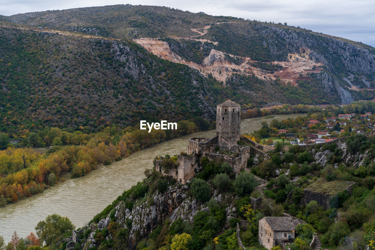 high angle view of townscape and mountains