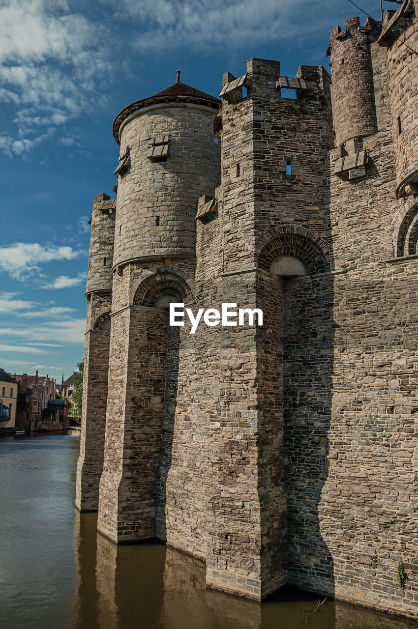 Stone wall and tower at the gravensteen castle in ghent. a city with gothic buildings in belgium.