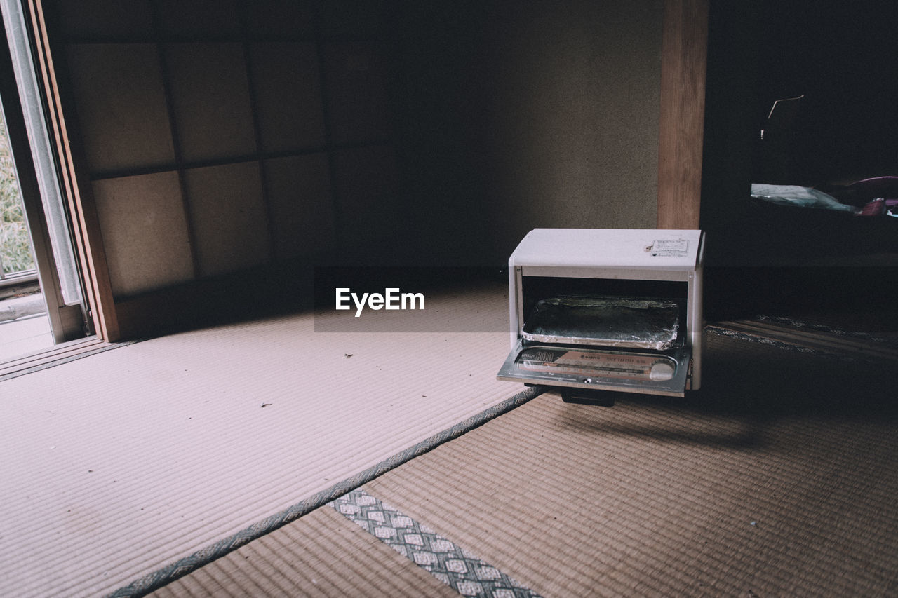 High angle view of toaster on floor at home