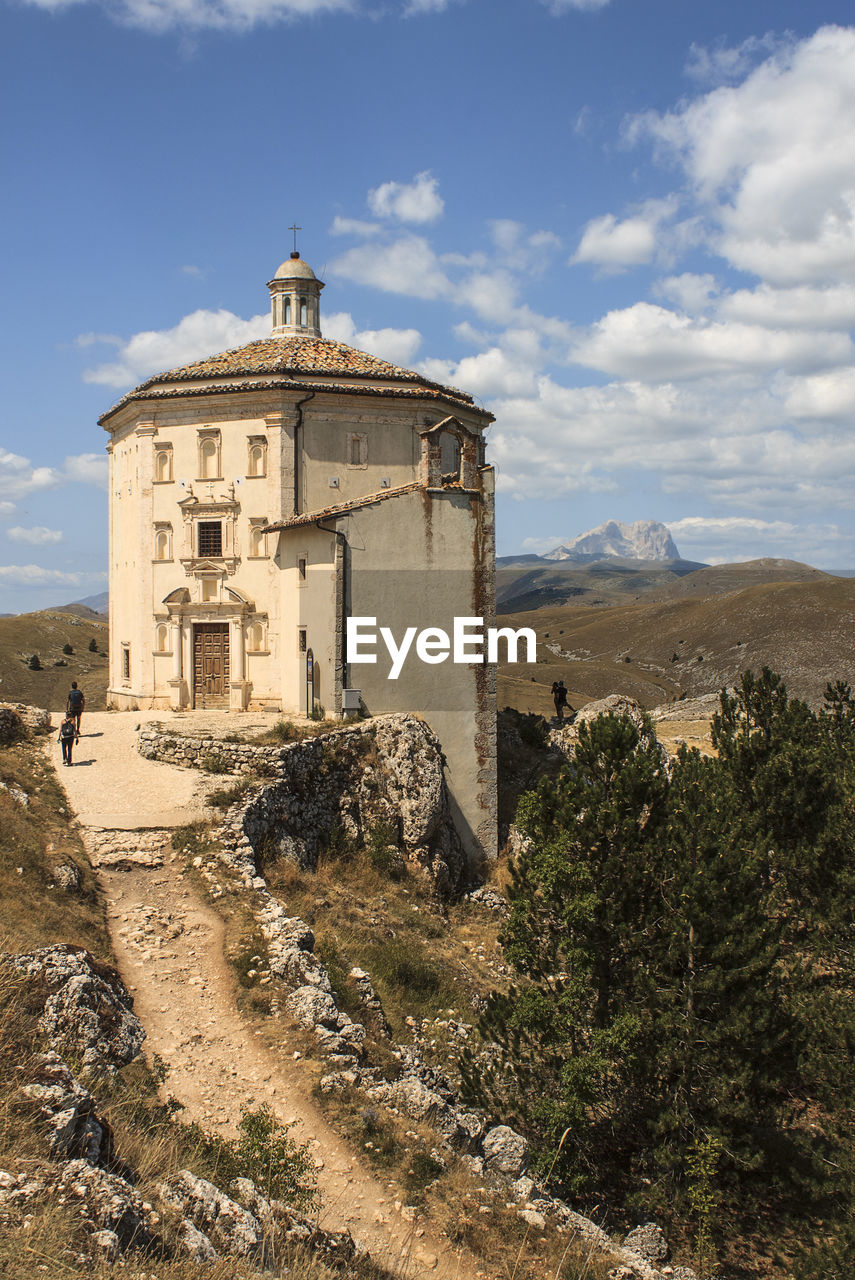 Historic church against sky in calascio