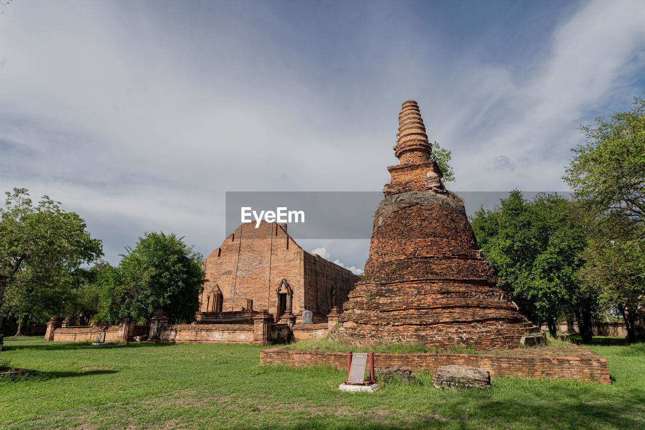 View of temple against cloudy sky