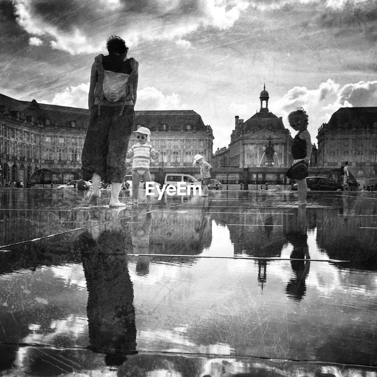 REFLECTION OF BUILDINGS IN WATER