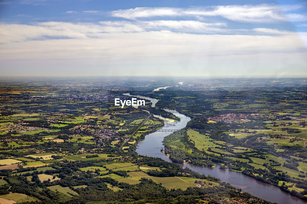 AERIAL VIEW OF RIVER AGAINST SKY