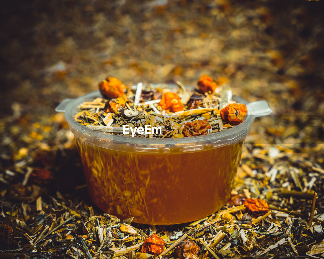 HIGH ANGLE VIEW OF DRINK IN GLASS CONTAINER