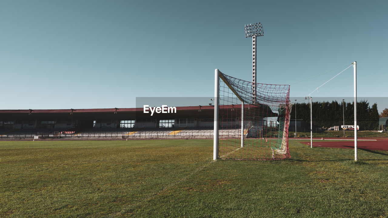 SOCCER FIELD AGAINST CLEAR SKY