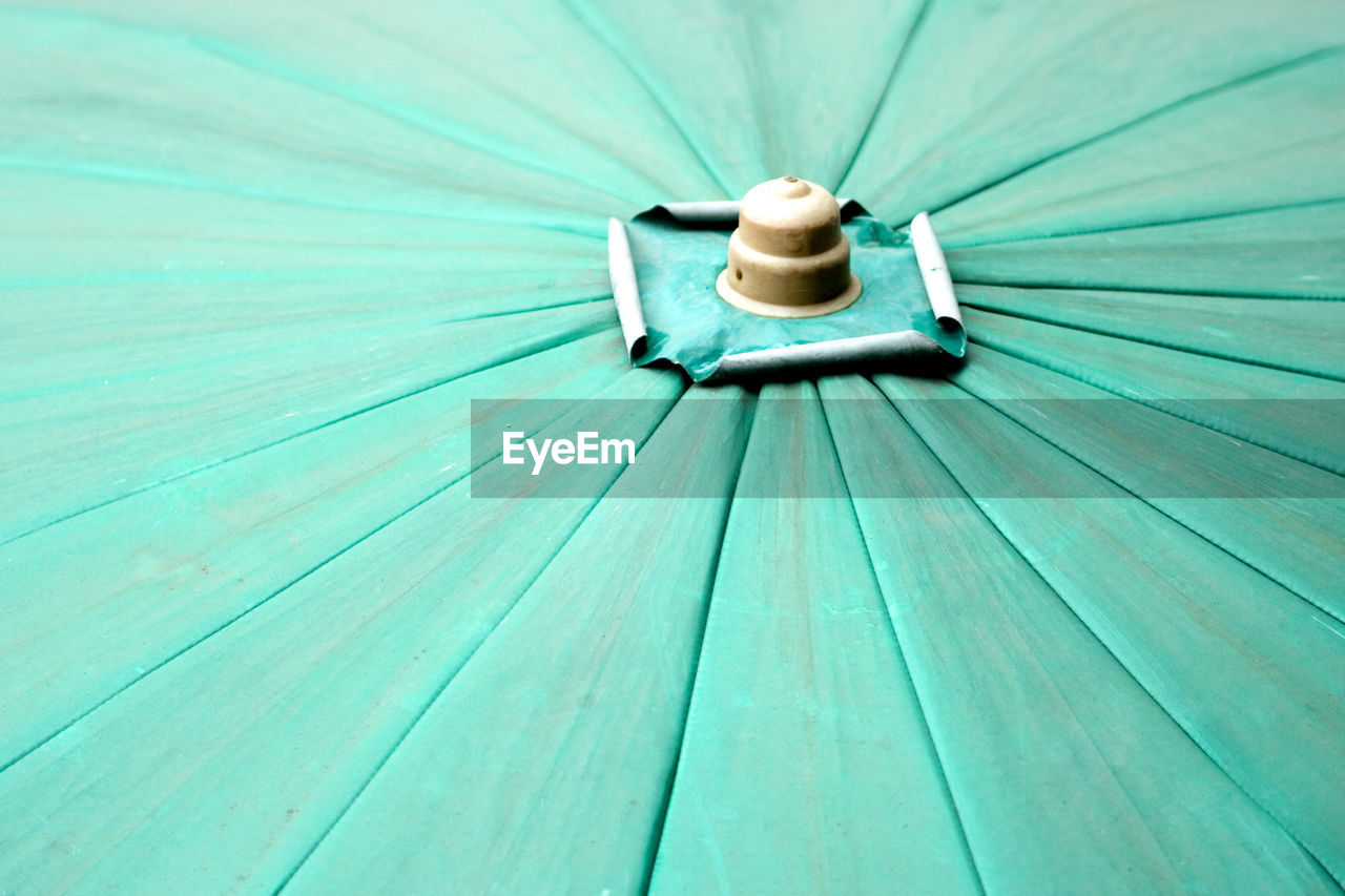 HIGH ANGLE VIEW OF WOOD ON WOODEN FLOOR