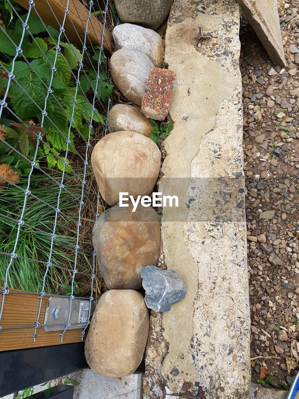 HIGH ANGLE VIEW OF FRESH VEGETABLES ON STONE