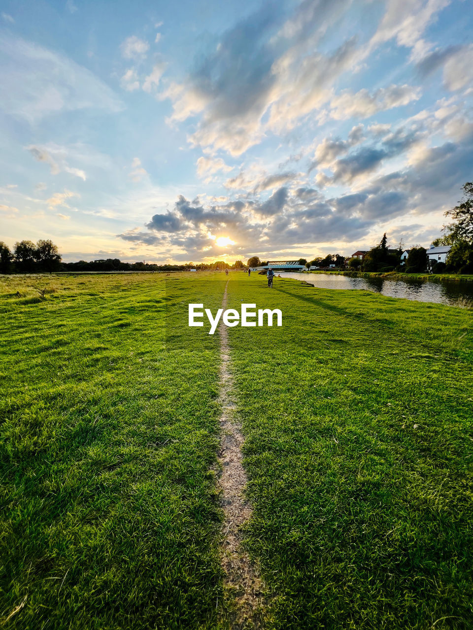 Scenic view of fen ditton meadow against sky during sunset in cambridge