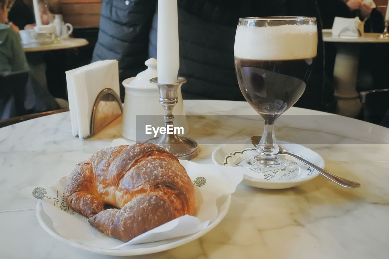 CLOSE-UP OF BREAKFAST SERVED ON TABLE