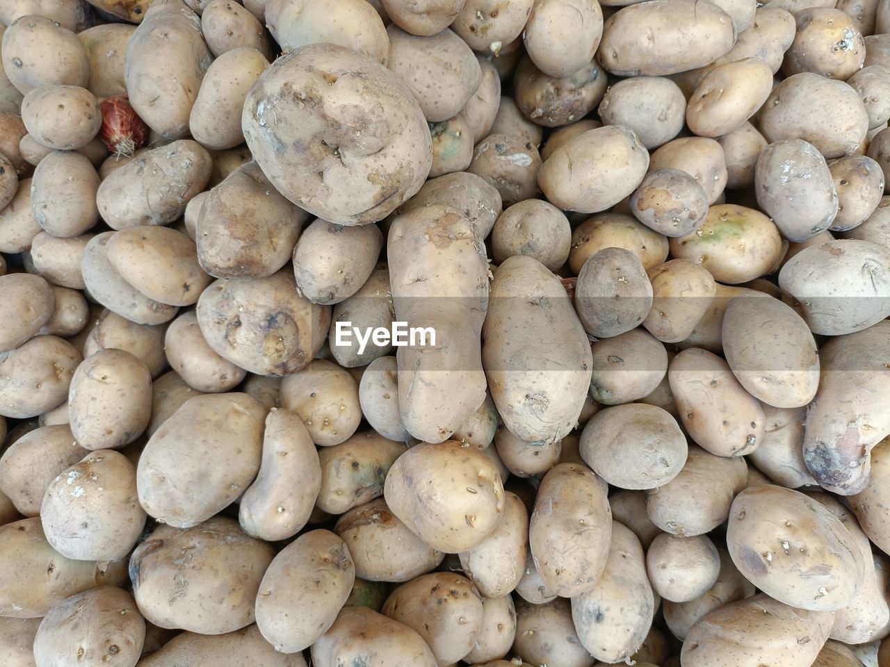 Full frame shot of potatoes for sale at market stall
