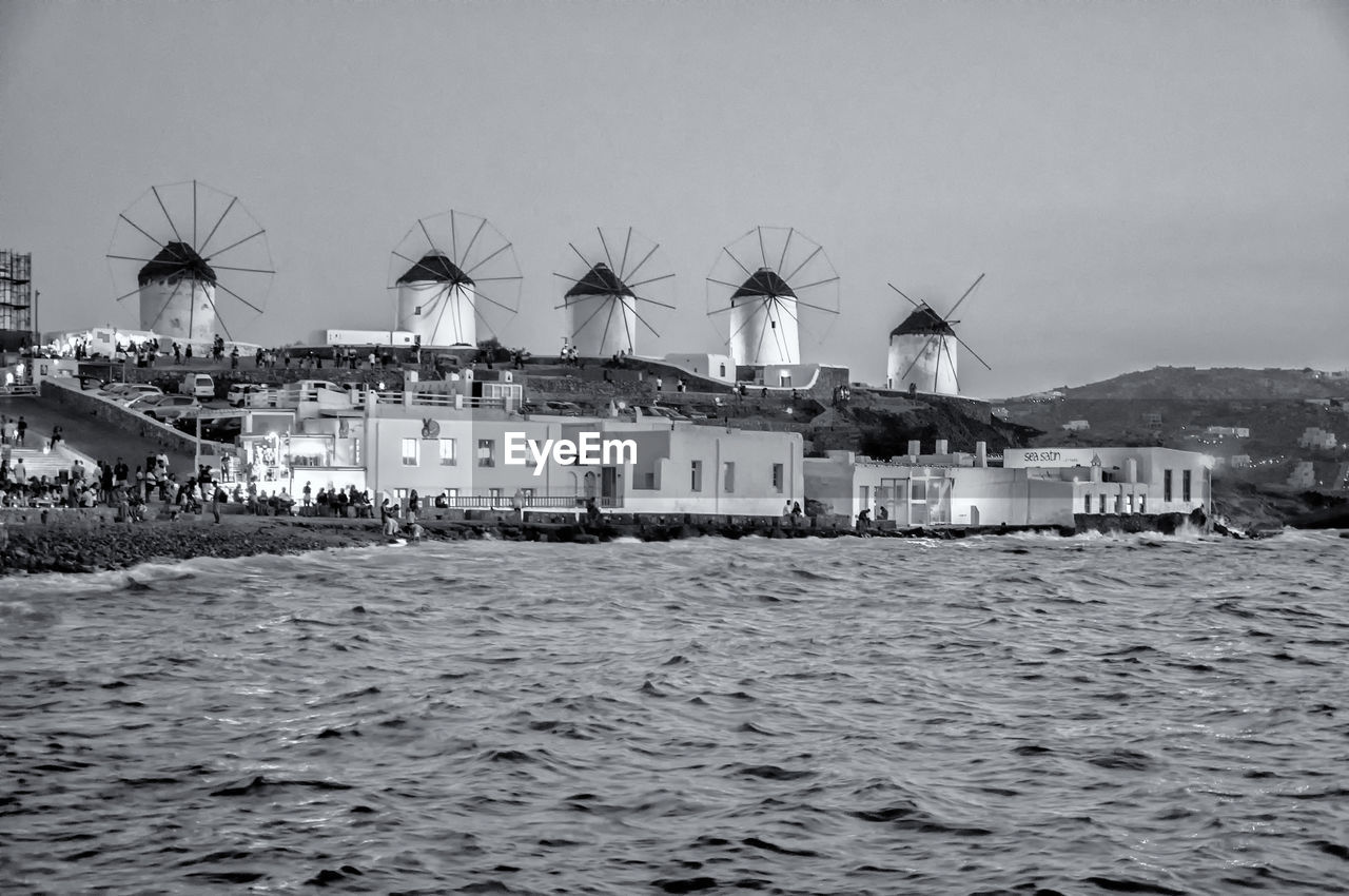 VIEW OF BUILDINGS ON BEACH AGAINST SKY