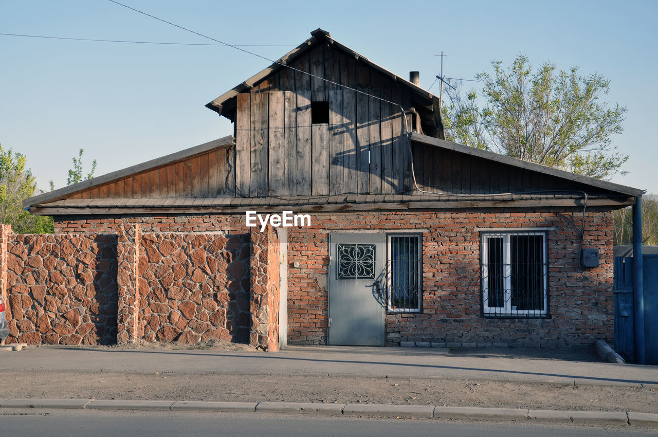 OLD BUILDING AGAINST SKY