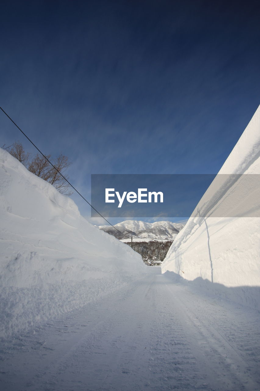 Snow covered mountain against sky