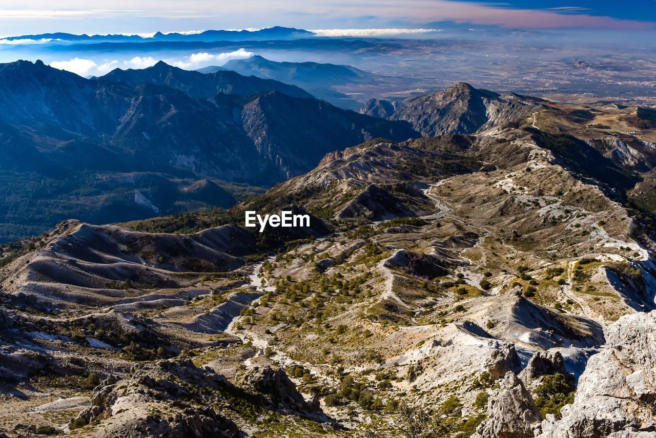 High angle view of mountains against sky