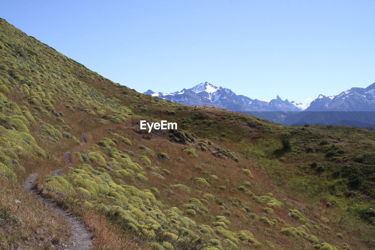 Scenic view of mountains against clear sky