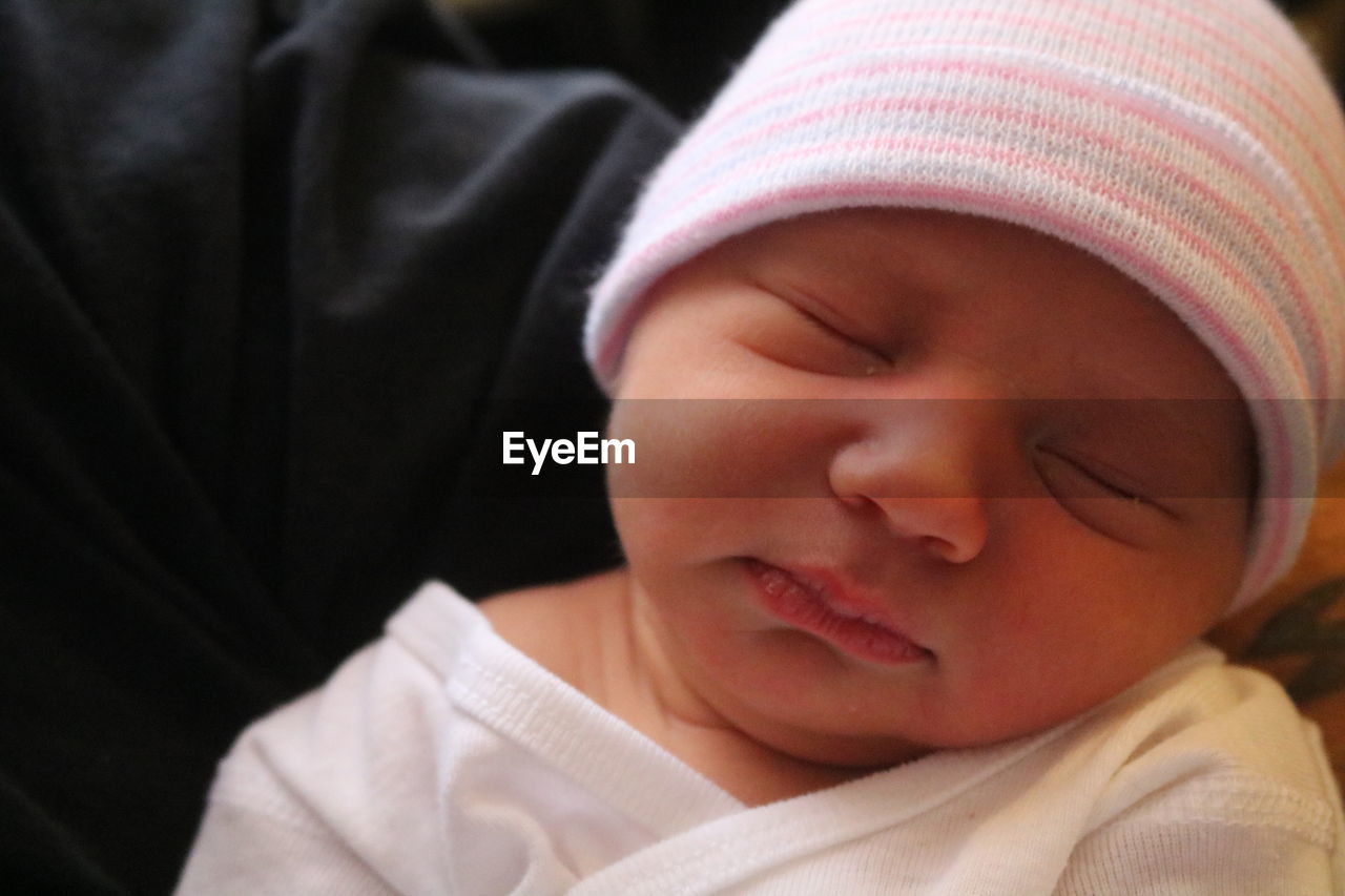 Close-up of cute baby sleeping