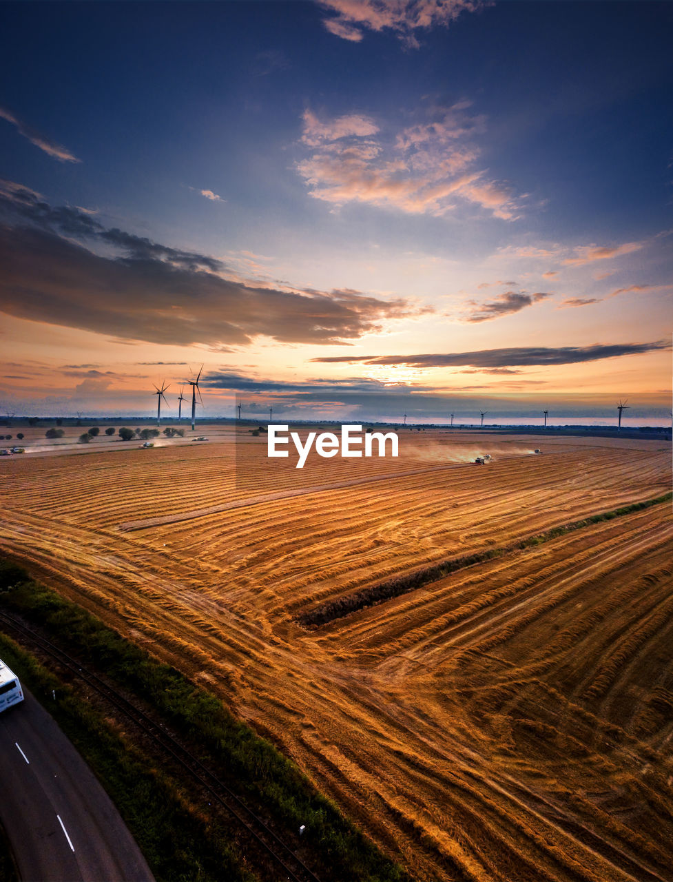 SCENIC VIEW OF ROAD DURING SUNSET