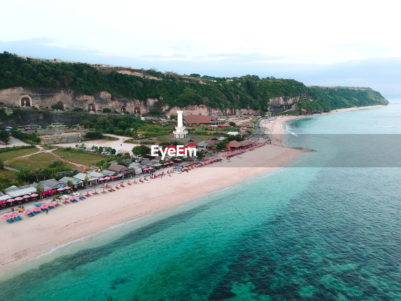 HIGH ANGLE VIEW OF TOURIST RESORT AT SEASIDE