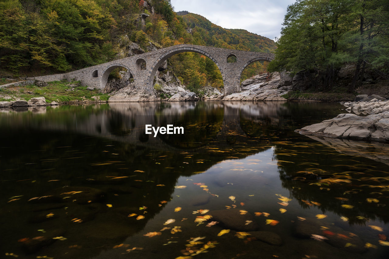 ARCH BRIDGE OVER RIVER