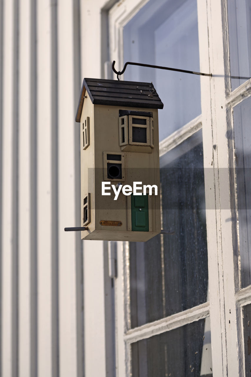 Advanced birdhouse hanging outside windows