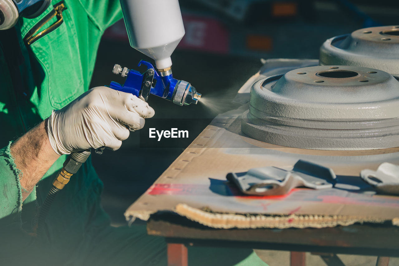 Midsection of man working