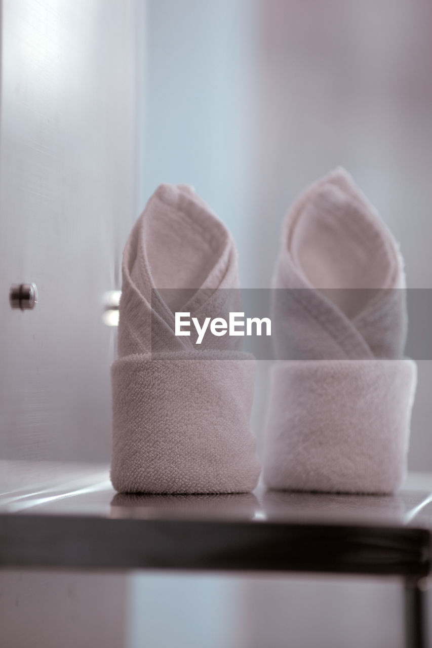 Close-up of towels on table at home