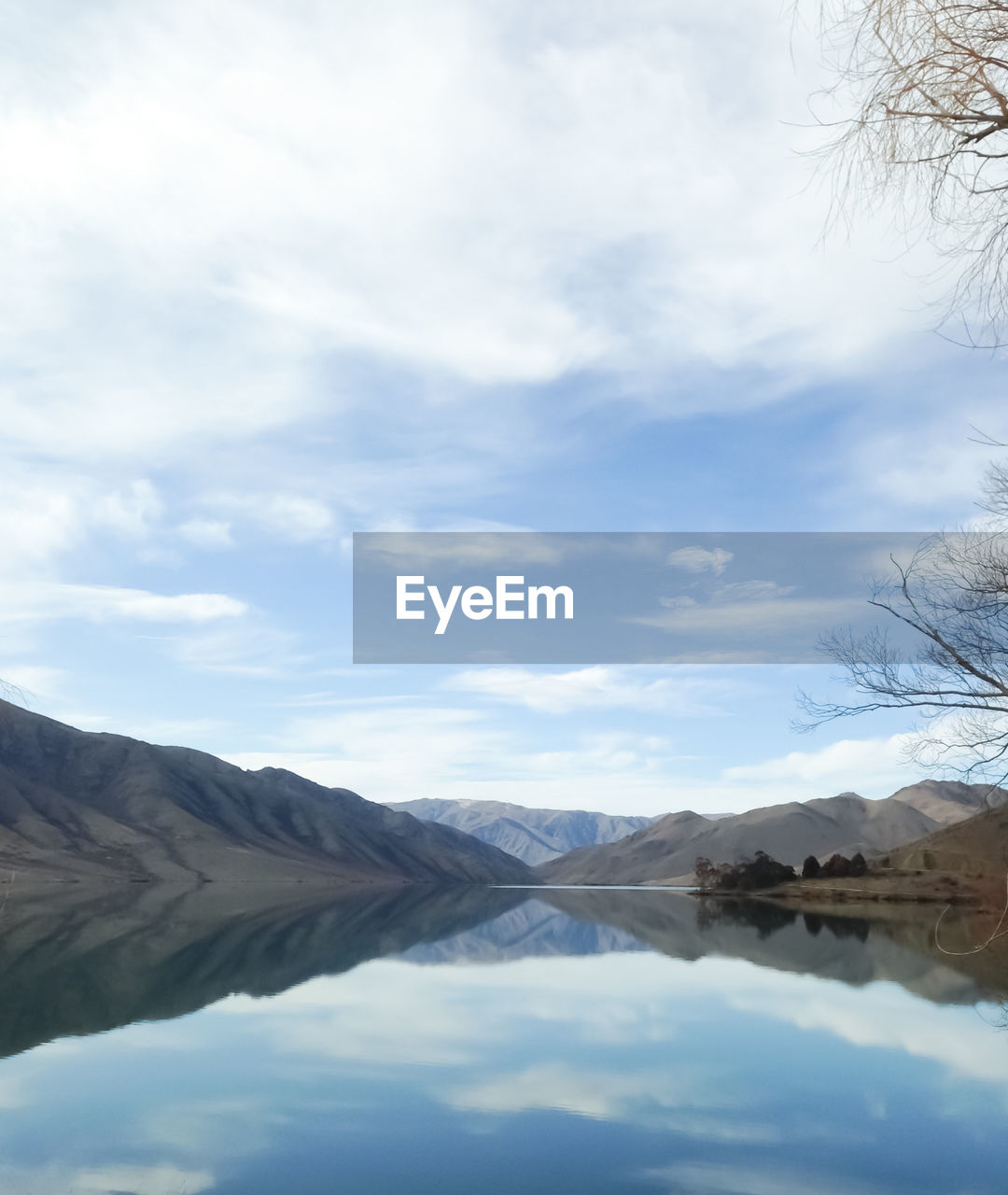 SCENIC VIEW OF MOUNTAINS AND SKY