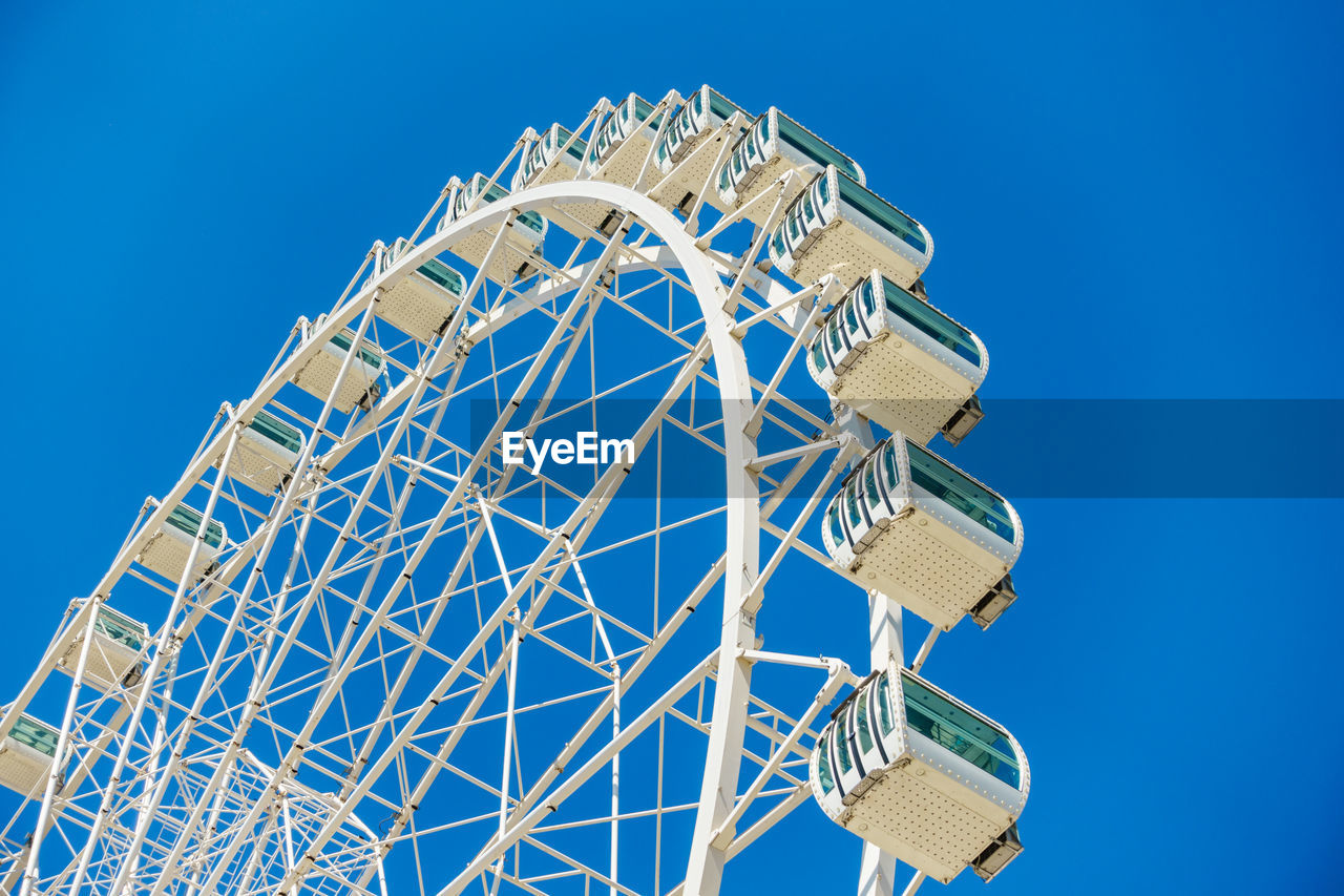 LOW ANGLE VIEW OF FERRIS WHEEL AGAINST SKY