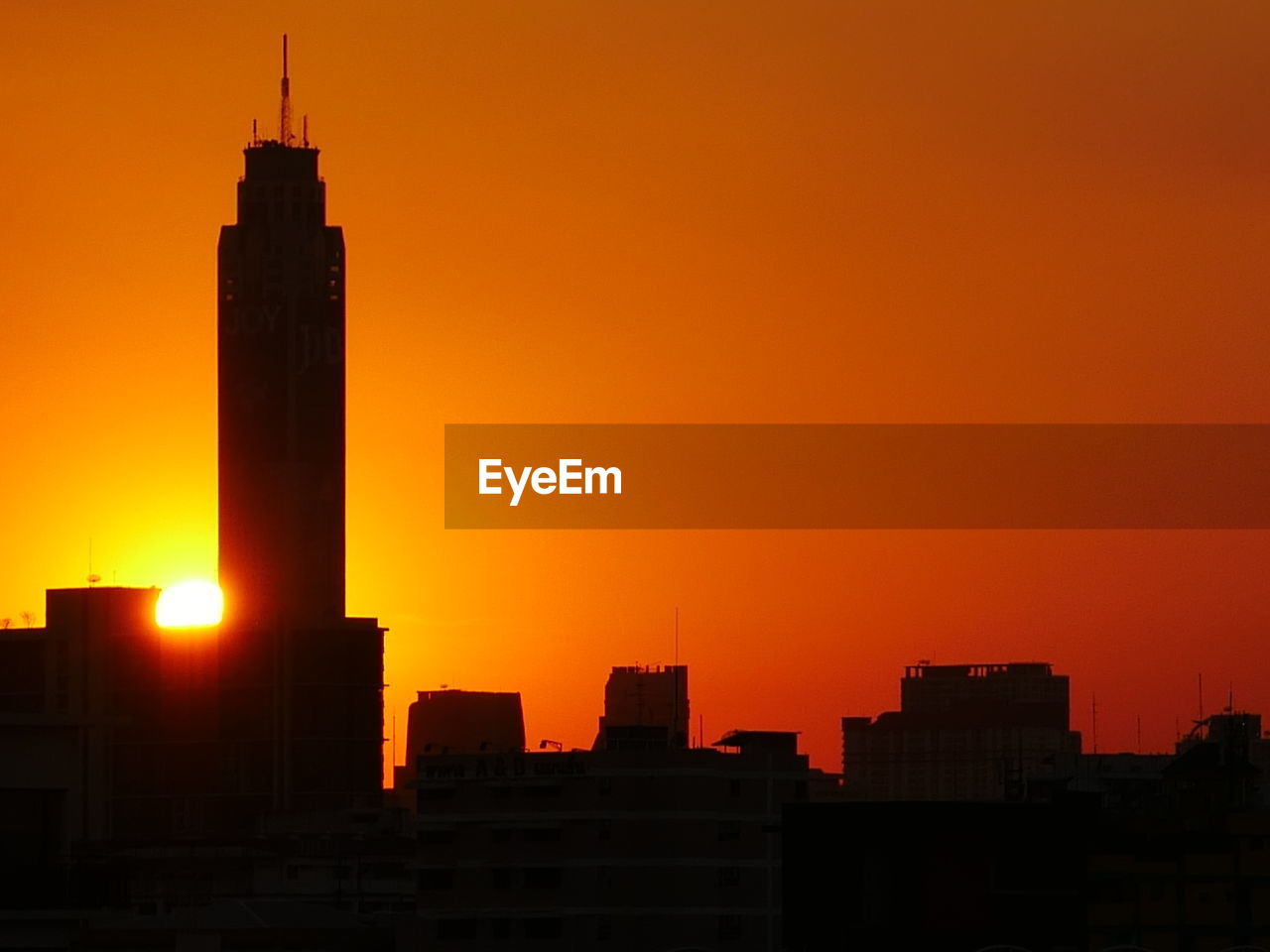 View of skyscrapers at sunset