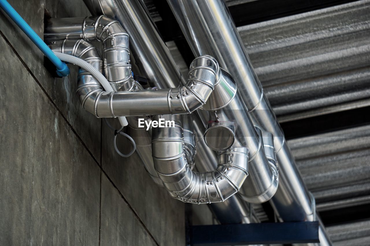 Close-up of pipes on wall