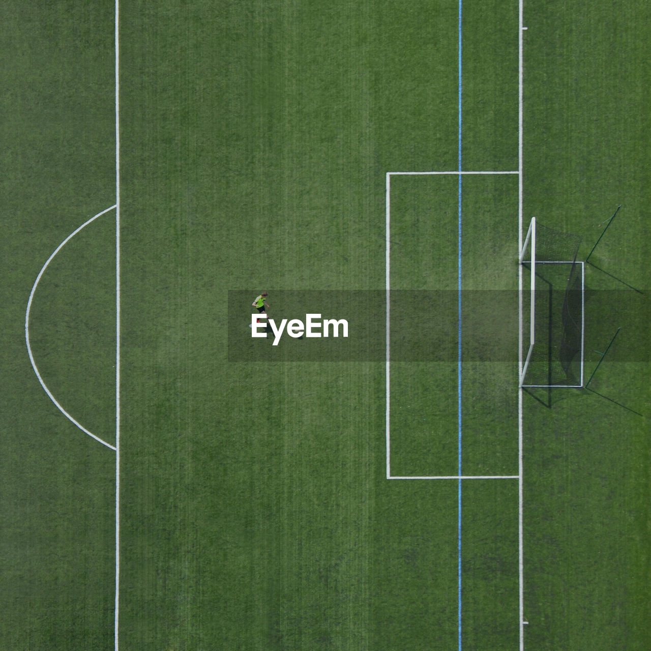 High angle view of soccer ball on green grass