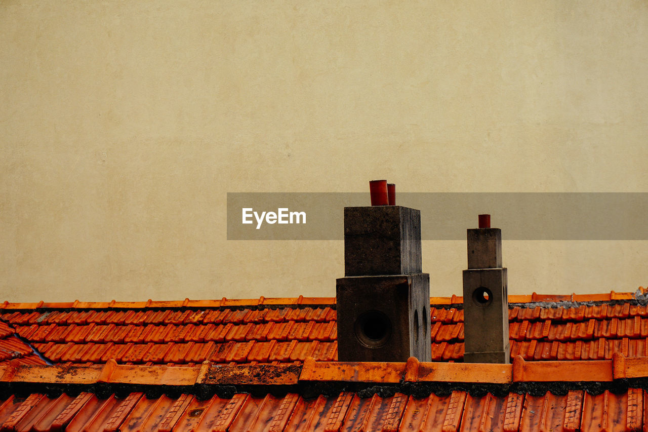 Close-up of chimneys on roof