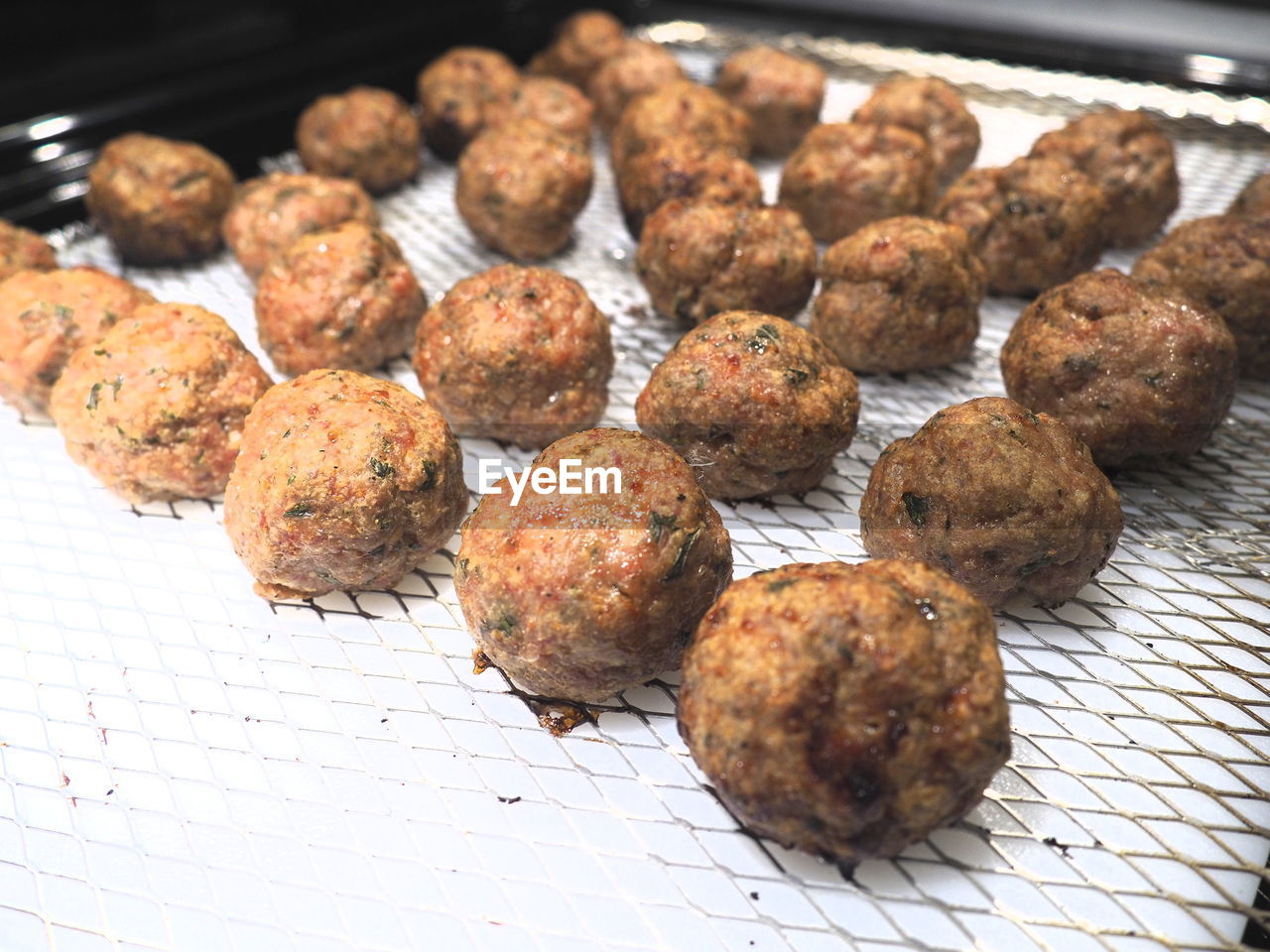 CLOSE-UP OF MEAT IN CONTAINER